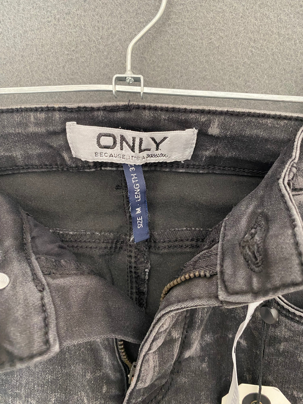 Jean skinny gris délavé neige