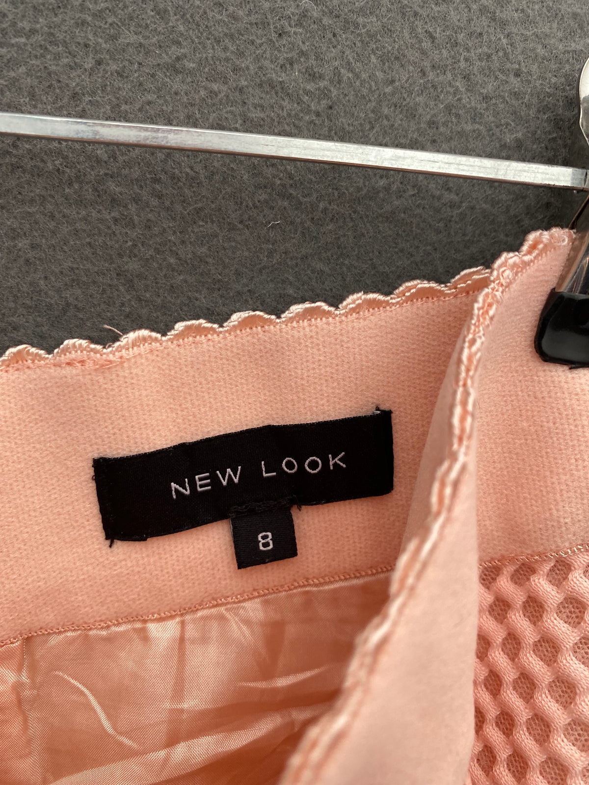Jupe patineuse midi texturée pêche