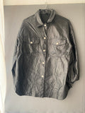 Surchemise en simili cuir noire