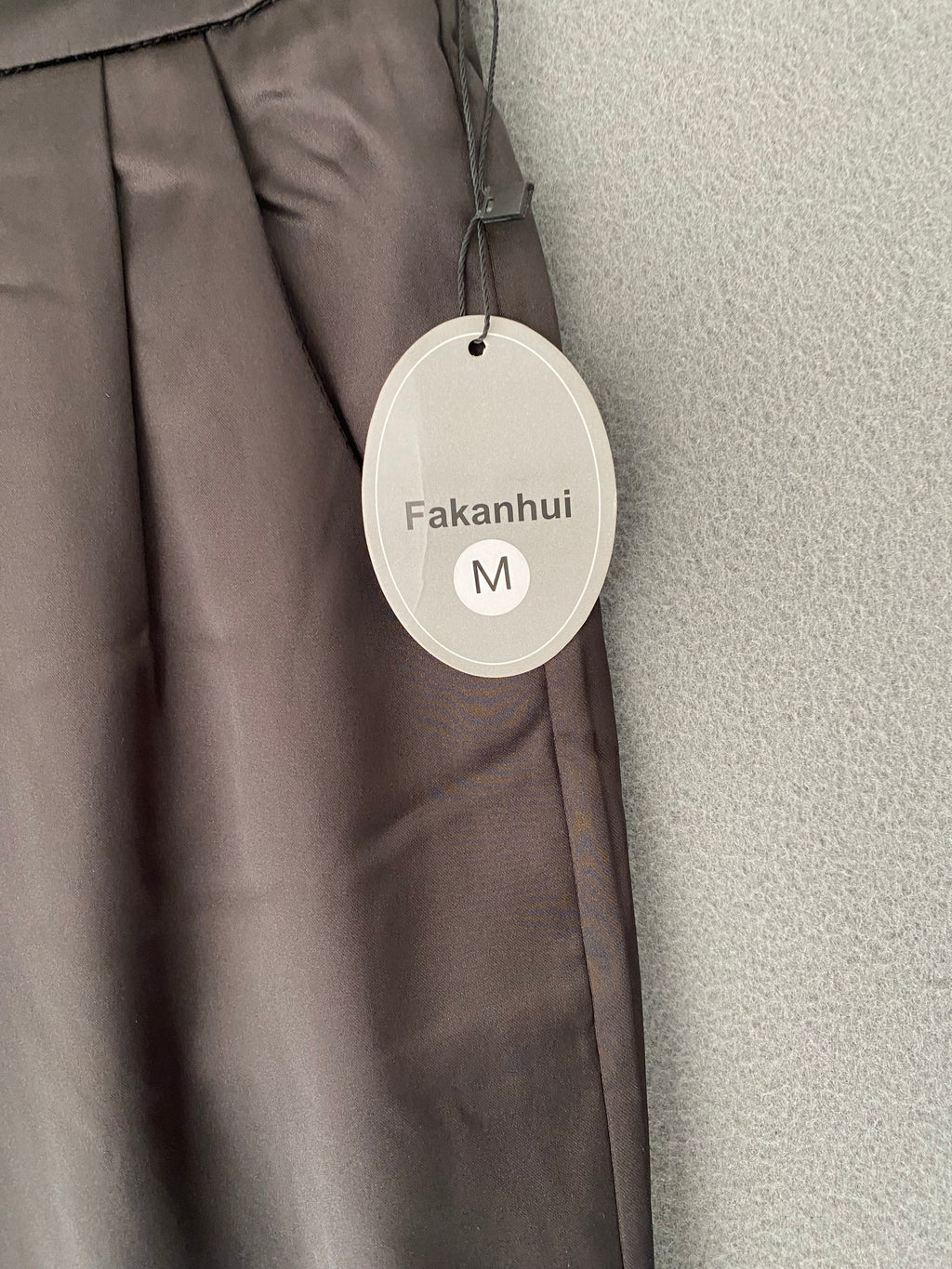 Pantalon noir satiné à taille élastique