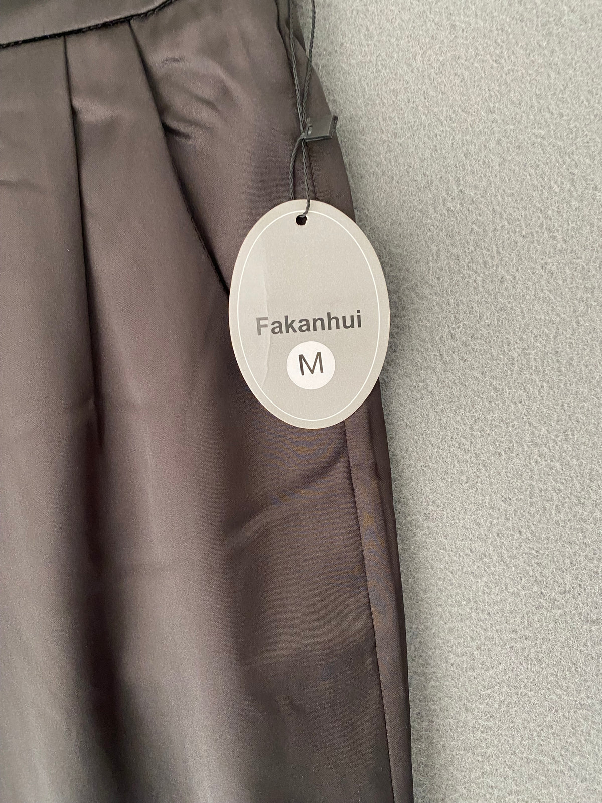 Pantalon noir satiné à taille élastique