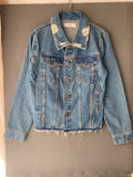 Veste en jean destroy à bas effiloché