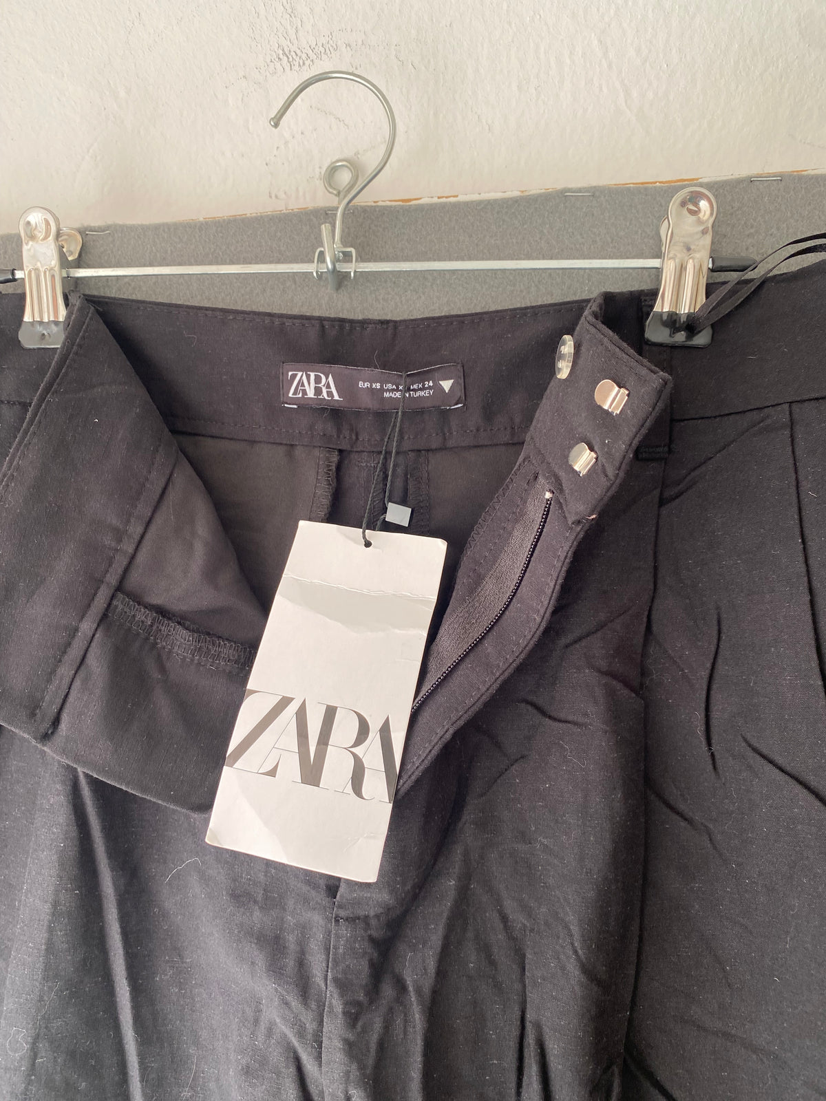 Pantalon large noir à pinces