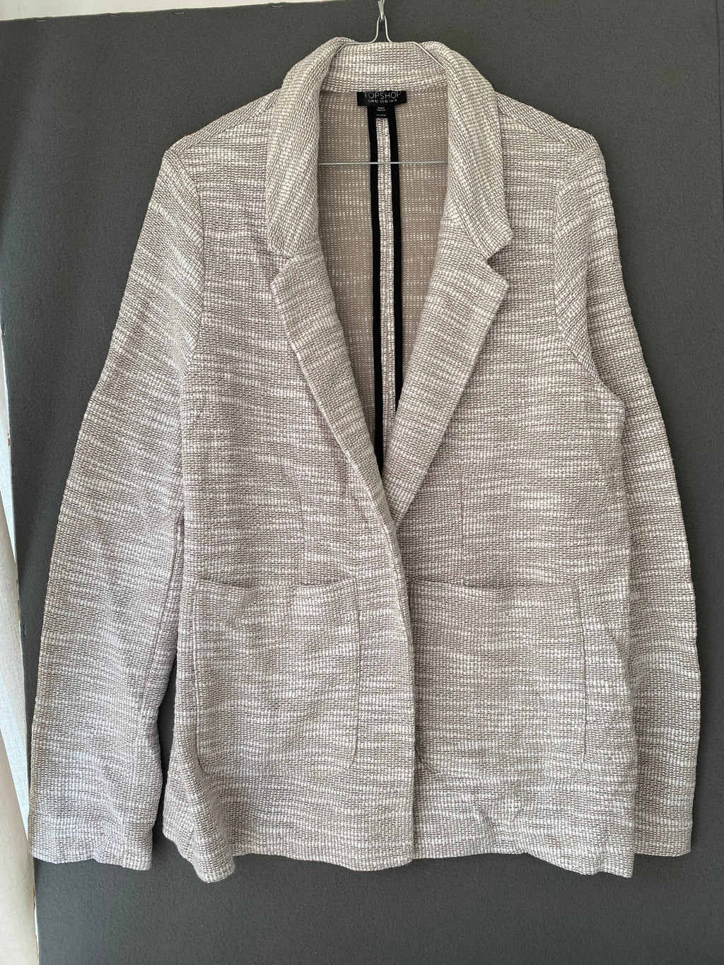 Blazer en maille texturée beige et blanc