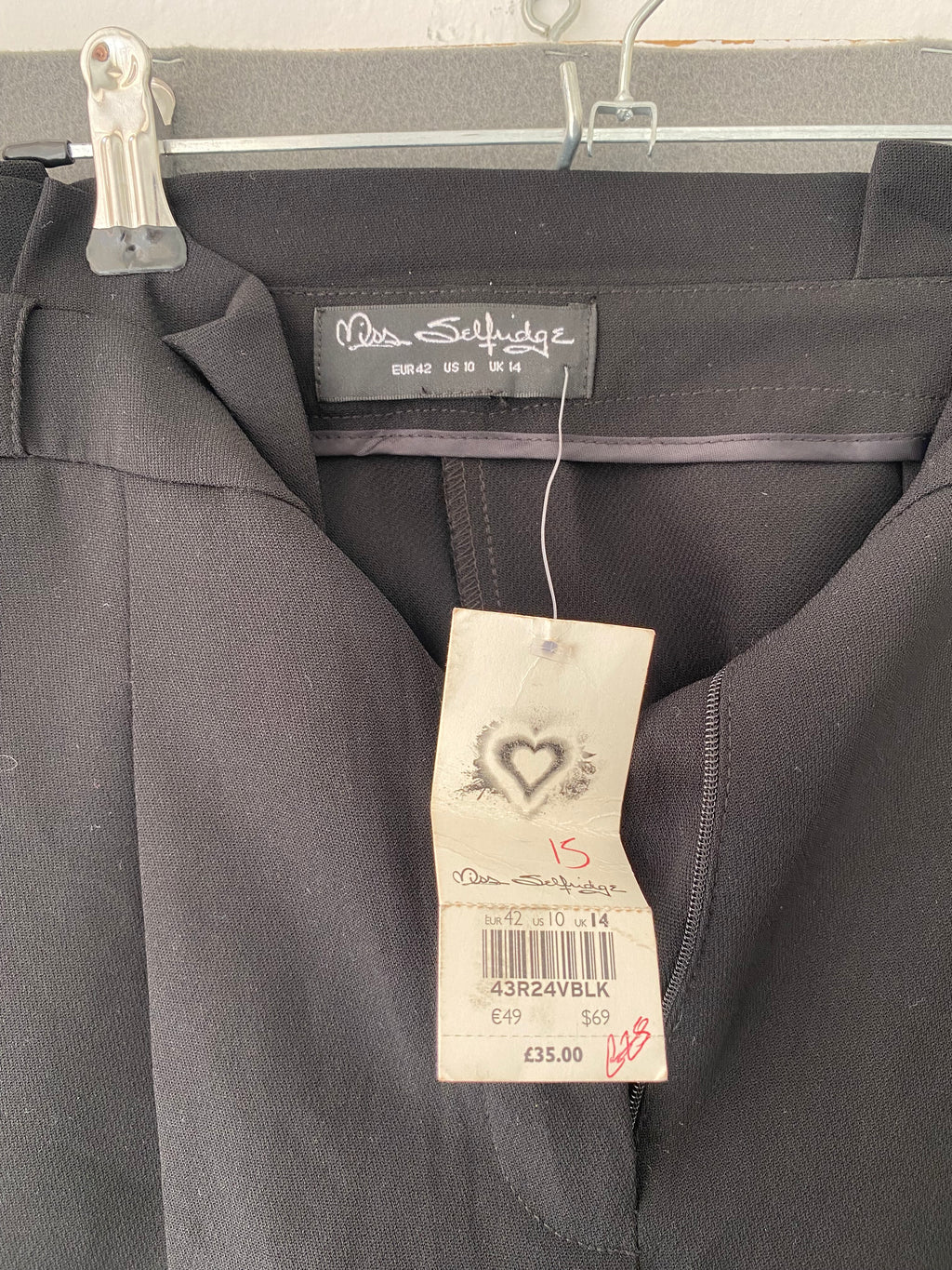 Pantalon carotte noir à pinces taille haute