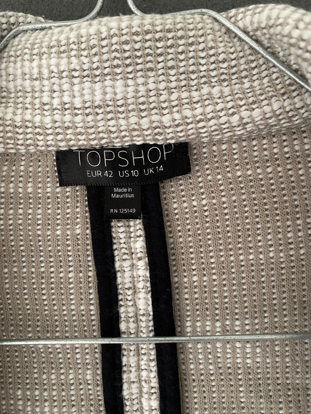 Blazer en maille texturée beige et blanc