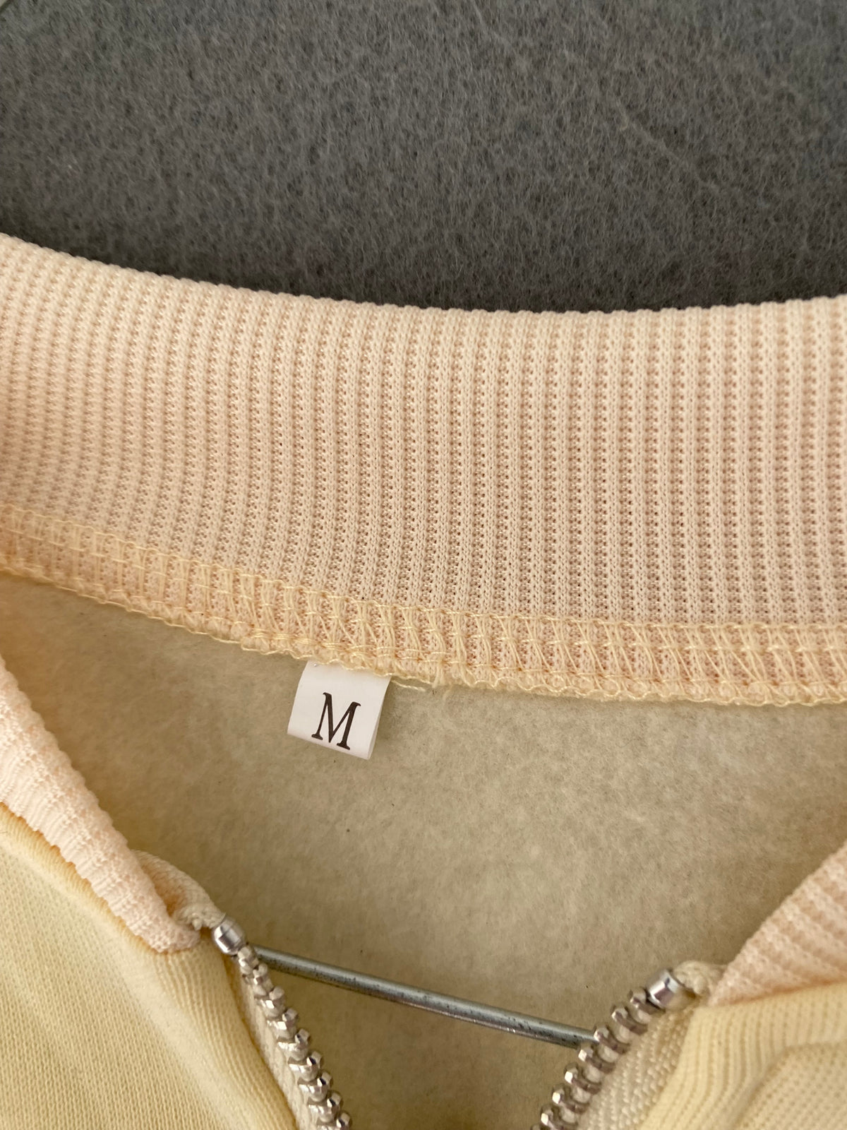 Veste bomber molletonnée jaune pastel